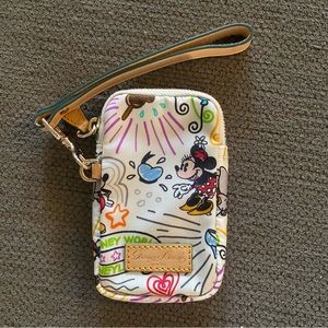 NWOT Dooney & Bourke Disney Sketch Ivory Phone Case. In brand new condition.